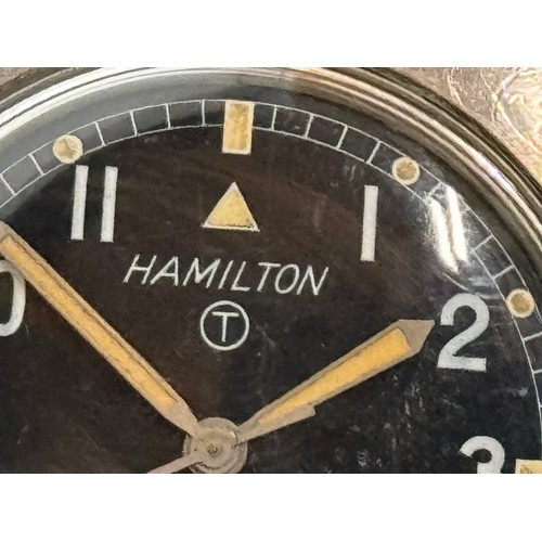 10 - A Gents military issue wristwatch by Hamilton.

This lot is available for in-house shipping