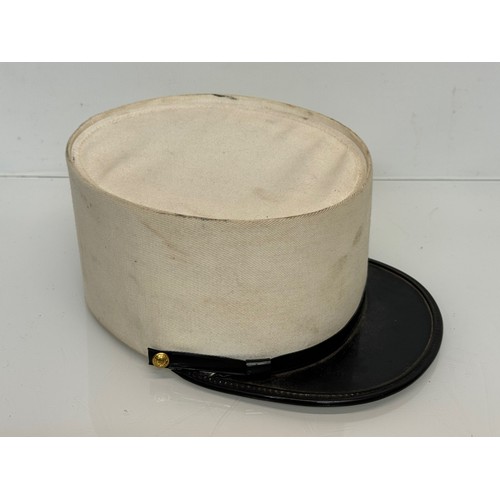 102 - Militaria, clothing, hats,  a French Foreign Legion Kepi.

This lot is available for in-house shippi... 