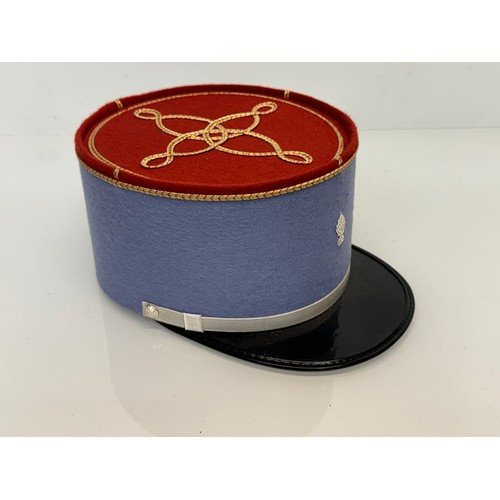 103 - Militaria, clothing, hats,  a dress uniform French Foreign Legion Kepi.

This lot is available for i... 