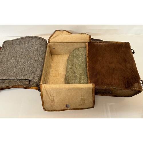 104 - Militaria, a pony skin ruck sac dated 45.

This lot is available for in-house shipping