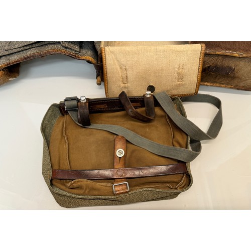 104 - Militaria, a pony skin ruck sac dated 45.

This lot is available for in-house shipping