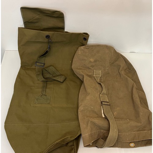 107 - Militaria, military clothing kit bags, one is new old stock.

This lot is available for in-house shi... 