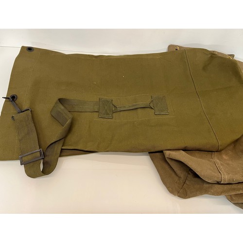 107 - Militaria, military clothing kit bags, one is new old stock.

This lot is available for in-house shi... 