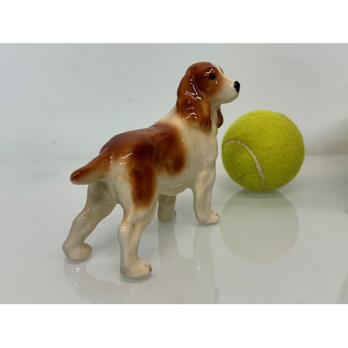 154 - Two ceramic dog figurines, a collie and a spaniel, Beswick?

This lot is available for in-house ship... 