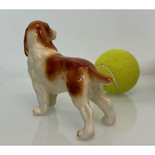 154 - Two ceramic dog figurines, a collie and a spaniel, Beswick?

This lot is available for in-house ship... 