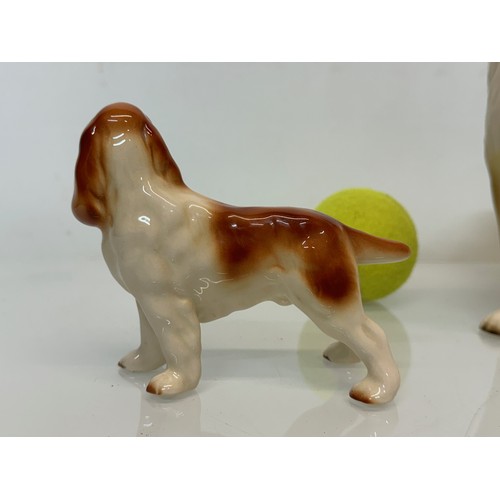 154 - Two ceramic dog figurines, a collie and a spaniel, Beswick?

This lot is available for in-house ship... 