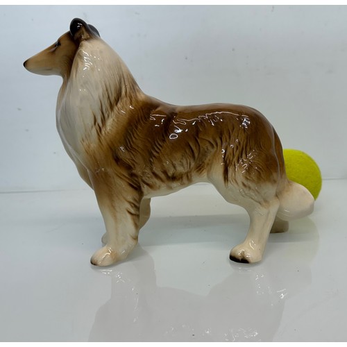 154 - Two ceramic dog figurines, a collie and a spaniel, Beswick?

This lot is available for in-house ship... 