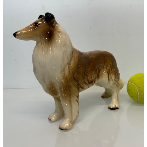 154 - Two ceramic dog figurines, a collie and a spaniel, Beswick?

This lot is available for in-house ship... 