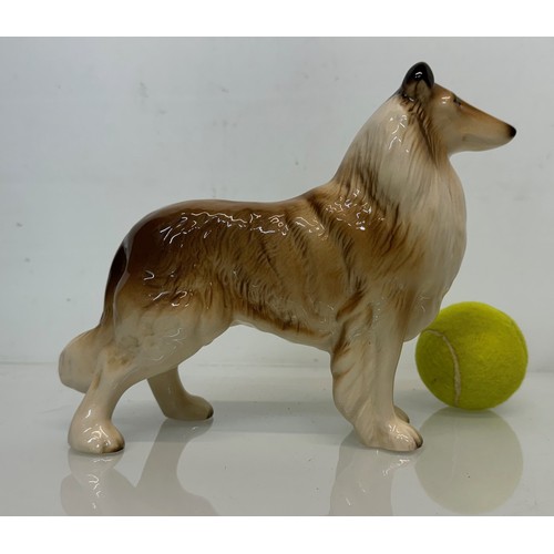 154 - Two ceramic dog figurines, a collie and a spaniel, Beswick?

This lot is available for in-house ship... 