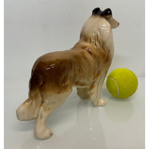 154 - Two ceramic dog figurines, a collie and a spaniel, Beswick?

This lot is available for in-house ship... 