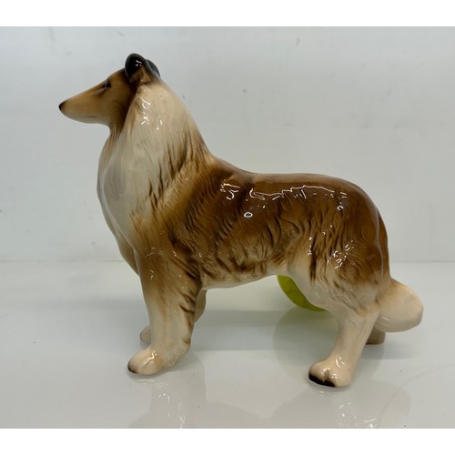 154 - Two ceramic dog figurines, a collie and a spaniel, Beswick?

This lot is available for in-house ship... 