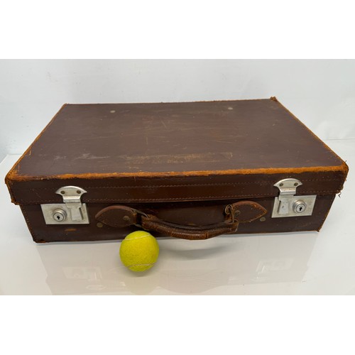 156 - Leather suitcase full with a collection of wooden and metal shoe lasts.

This lot is available for i... 