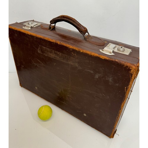 156 - Leather suitcase full with a collection of wooden and metal shoe lasts.

This lot is available for i... 