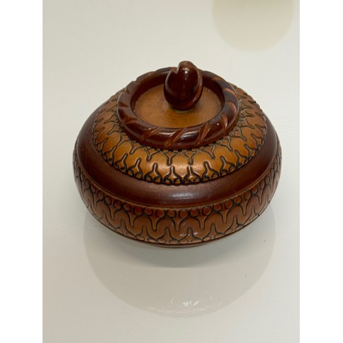 161 - Decorative treen storage pots, 8 in all.

This lot is available for in-house shipping