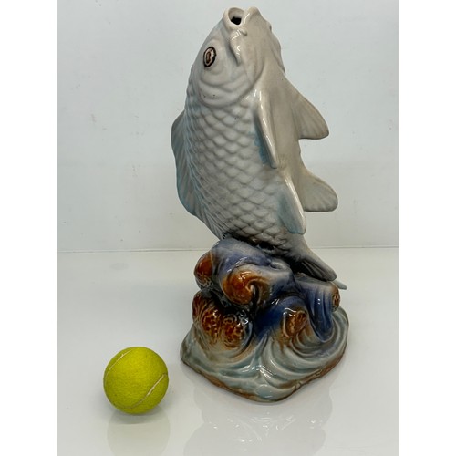 165 - Ceramic figurine of a carp, 40 cm tall.

This lot is available for in-house shipping