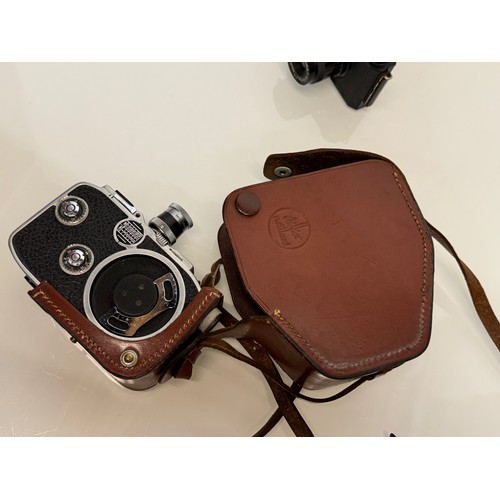 167 - Paillard Bolex camera and leather case.

This lot is available for in-house shipping