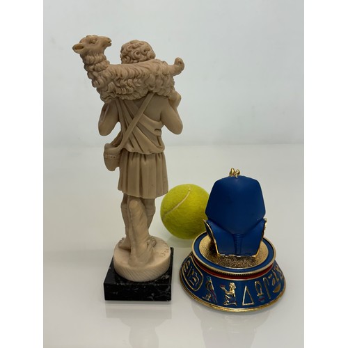 170 - Tutankhamun golden mask figurine and classical figure of a shepherd 23 cm tall.

This lot is availab... 