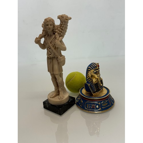 170 - Tutankhamun golden mask figurine and classical figure of a shepherd 23 cm tall.

This lot is availab... 