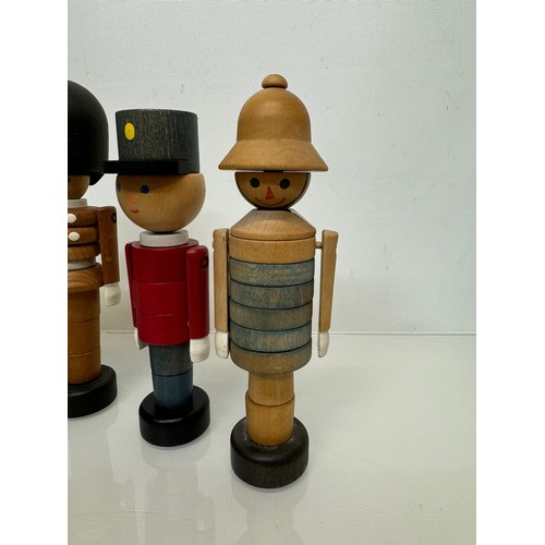 51 - Mid century wooden toy figures each is 20 cm tall.

This lot is available for in-house shipping