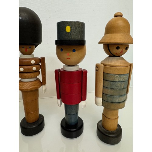 51 - Mid century wooden toy figures each is 20 cm tall.

This lot is available for in-house shipping