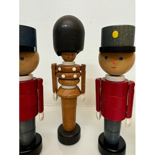 51 - Mid century wooden toy figures each is 20 cm tall.

This lot is available for in-house shipping