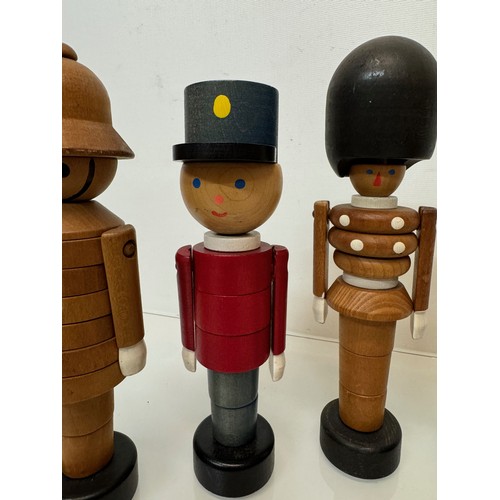 51 - Mid century wooden toy figures each is 20 cm tall.

This lot is available for in-house shipping