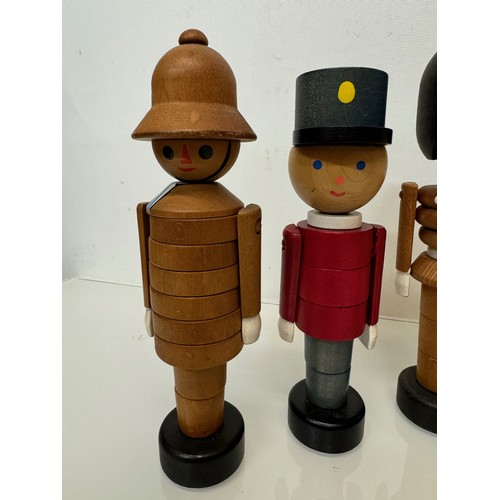 51 - Mid century wooden toy figures each is 20 cm tall.

This lot is available for in-house shipping