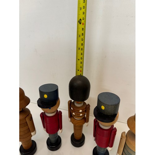 51 - Mid century wooden toy figures each is 20 cm tall.

This lot is available for in-house shipping