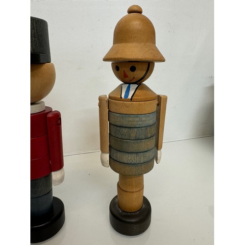 51 - Mid century wooden toy figures each is 20 cm tall.

This lot is available for in-house shipping