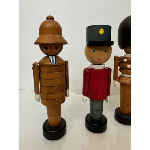 51 - Mid century wooden toy figures each is 20 cm tall.

This lot is available for in-house shipping