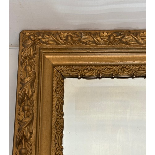 127 - Bevel edged wall mirror in a nice quality decorative frame, 67 cm wide.

This lot is available for i... 