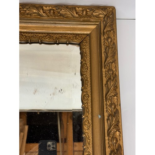 127 - Bevel edged wall mirror in a nice quality decorative frame, 67 cm wide.

This lot is available for i... 