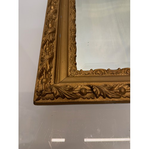 127 - Bevel edged wall mirror in a nice quality decorative frame, 67 cm wide.

This lot is available for i... 