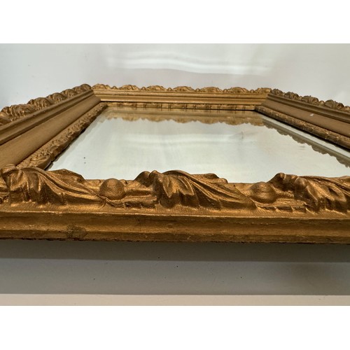 127 - Bevel edged wall mirror in a nice quality decorative frame, 67 cm wide.

This lot is available for i... 