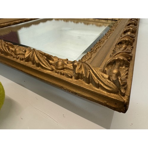 127 - Bevel edged wall mirror in a nice quality decorative frame, 67 cm wide.

This lot is available for i... 