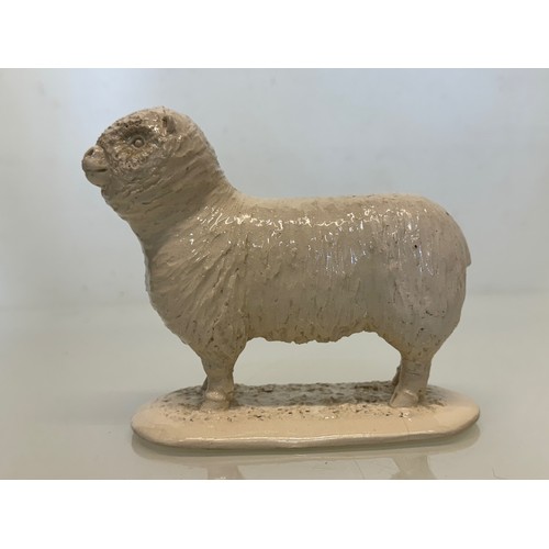 131 - Studio art pottery sheep, Colley Arts Pottery figure  by Peggy Alexander.

This lot is available for... 