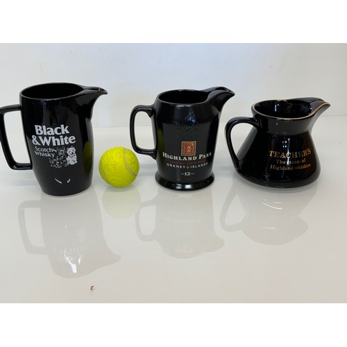 136 - Breweryana, advertising ceramics, three Whisky branded water jugs by Wade, Black & White Whisky, Hig... 