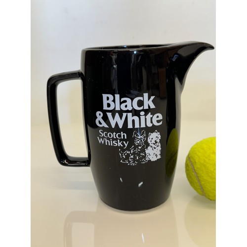 136 - Breweryana, advertising ceramics, three Whisky branded water jugs by Wade, Black & White Whisky, Hig... 