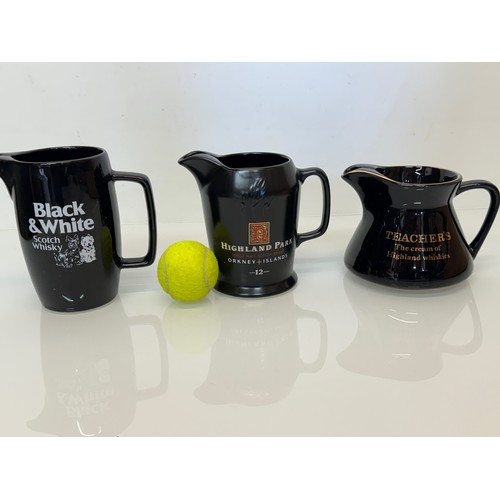 136 - Breweryana, advertising ceramics, three Whisky branded water jugs by Wade, Black & White Whisky, Hig... 