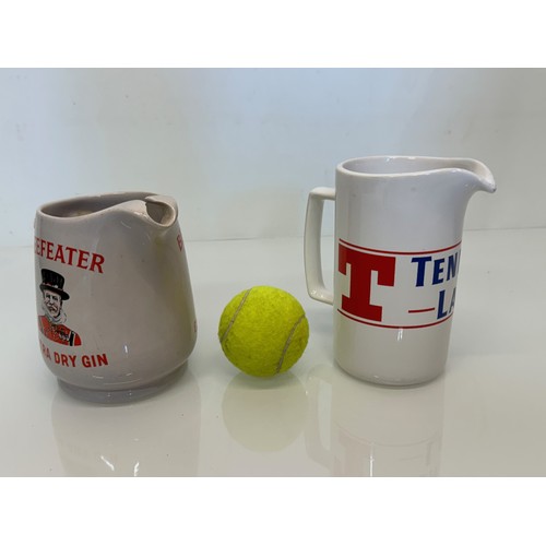 137 - Breweryana, advertising ceramics, two branded water jugs by Wade, Beefeater Gin and Tennants Lager.
... 