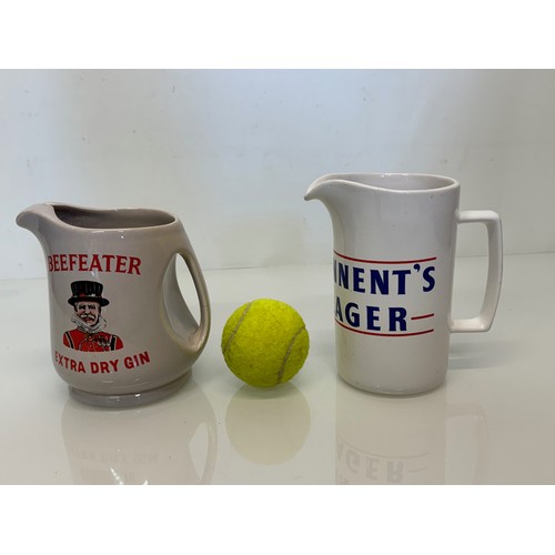 137 - Breweryana, advertising ceramics, two branded water jugs by Wade, Beefeater Gin and Tennants Lager.
... 