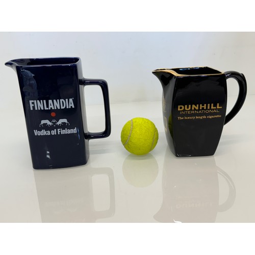 138 - Breweryana, advertising ceramics, two branded water jugs by Wade, Finlandia Vodka and Dunhill Intern... 