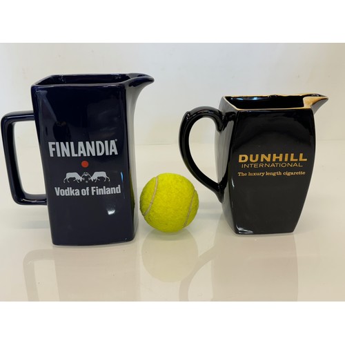 138 - Breweryana, advertising ceramics, two branded water jugs by Wade, Finlandia Vodka and Dunhill Intern... 