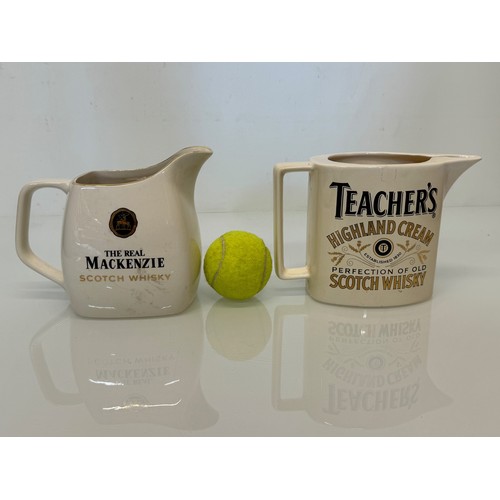 139 - Breweryana, advertising ceramics, two branded water jugs by Wade, Mackenzie Whisky and Teachers Whis... 