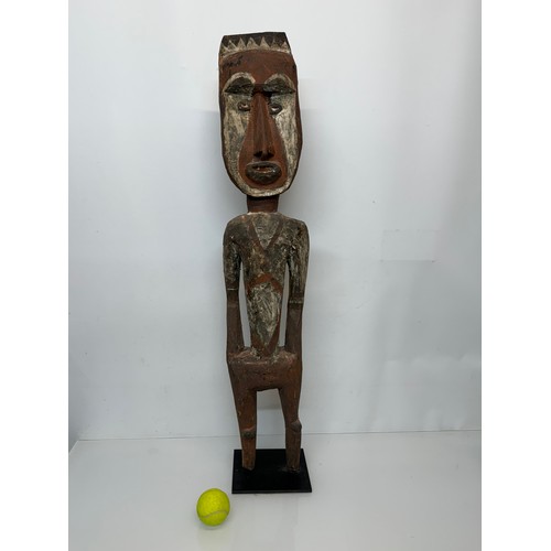 4 - Tribal art, hand carved and painted a large figure from New Guinea, 96 cm tall.

This lot is availab... 