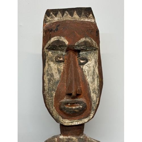 4 - Tribal art, hand carved and painted a large figure from New Guinea, 96 cm tall.

This lot is availab... 