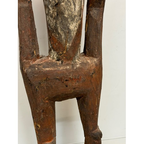 4 - Tribal art, hand carved and painted a large figure from New Guinea, 96 cm tall.

This lot is availab... 