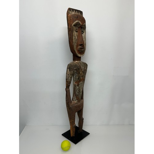 4 - Tribal art, hand carved and painted a large figure from New Guinea, 96 cm tall.

This lot is availab... 