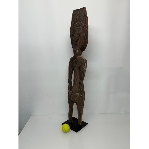 4 - Tribal art, hand carved and painted a large figure from New Guinea, 96 cm tall.

This lot is availab... 