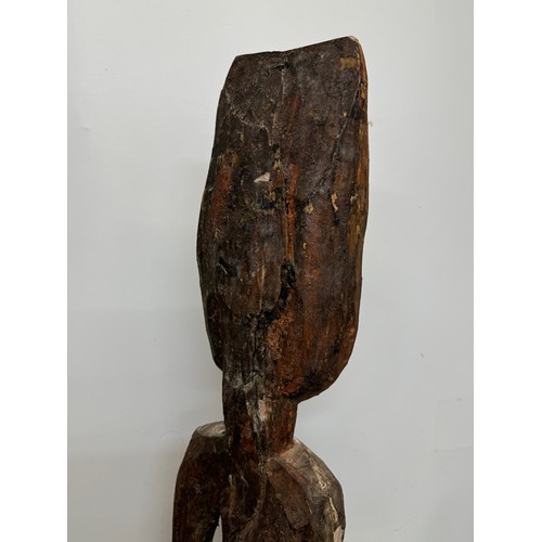 4 - Tribal art, hand carved and painted a large figure from New Guinea, 96 cm tall.

This lot is availab... 